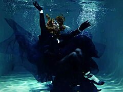 Arya Grander's seductive underwater performance in a swimming pool